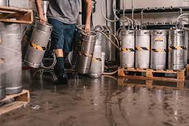 Consider sticking with colors that are natural and dark, with a splash of bold color. For example, a nice combination of colors could be a dark yellow, black, and a vibrant red. 